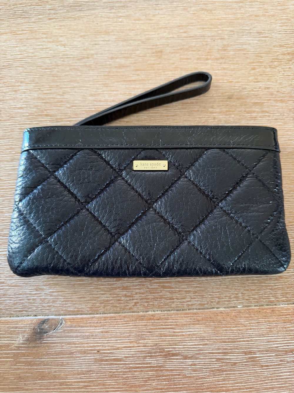 kate spade Black Quilted Leather Wristlet with Gold Logo Plate